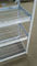 5 Wielo-poziomowe białe lekkie półki na brodziki szczelinowe - stojak kątowy w siatce drucianej